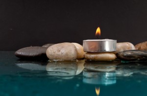 candle and stones